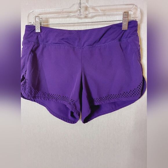 Athleta laser cutout hem purple 3" running shorts - Picture 2 of 10